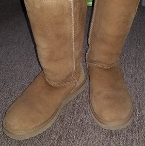 Size 8 UGG boots with care kit